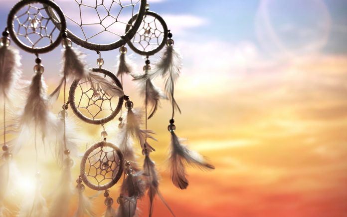 Dreamcatcher at sunset with copy space